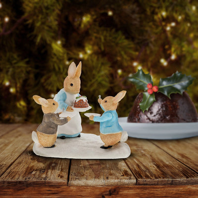 Mrs. Rabbit with a Christmas Pudding Figurine